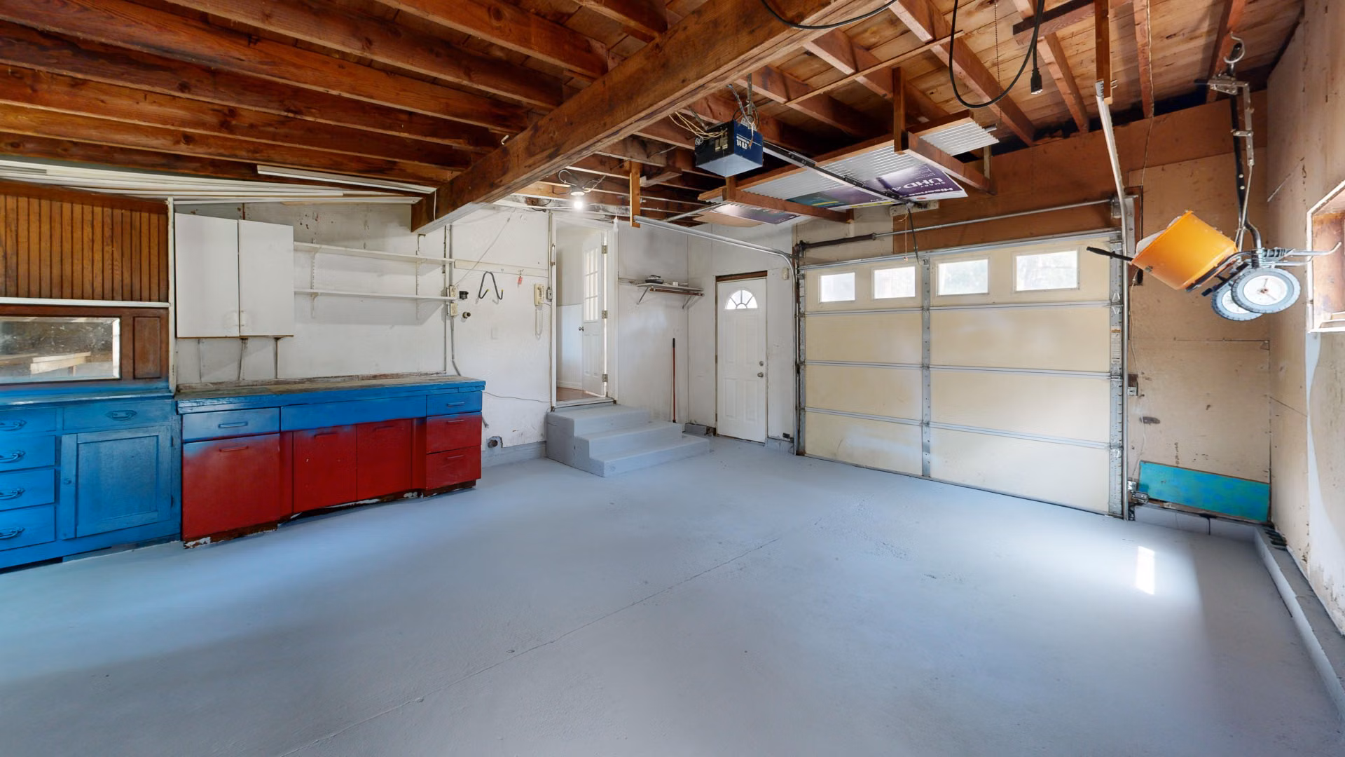 Clean, empty residential garage with room to park